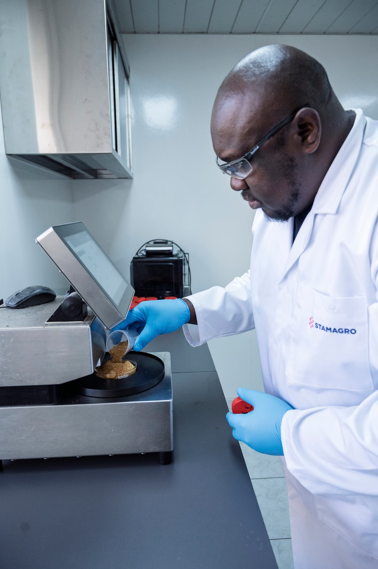 Empro laboratory technician analyzing a poultry protein sample